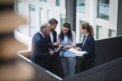 businesspeople-having-discussion Legal Professionals